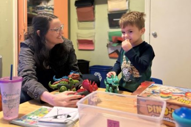 A child working with a KidWorks therapist